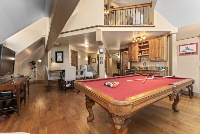 40924 Purple Sage St, Steamboat Springs, CO 80487 - game room with bar with sink, high vaulted ceiling, hardwood / wood-style floors, wine cooler, and pool table