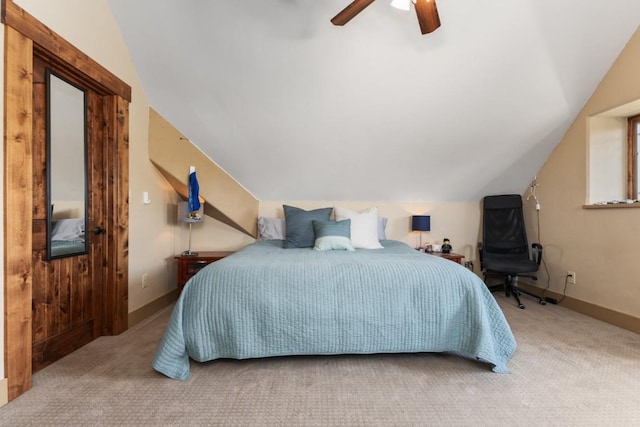 40924 Purple Sage St, Steamboat Springs, CO 80487 - bedroom with carpet flooring, vaulted ceiling, a ceiling fan, and baseboards