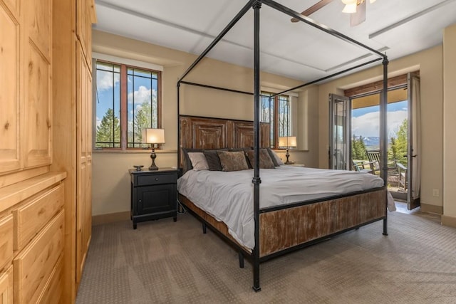 40924 Purple Sage St, Steamboat Springs, CO 80487 - carpeted bedroom featuring baseboards and access to outside