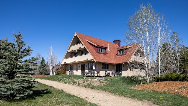 40924 Purple Sage St, Steamboat Springs, CO 80487 - back of property with a chimney and stucco siding