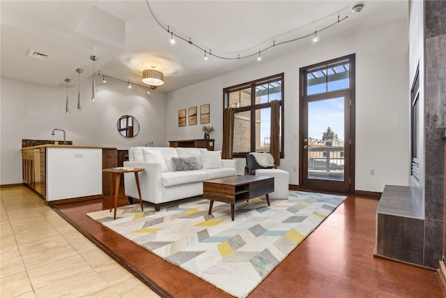 703 Lincoln Ave Unit B206, Steamboat Springs, CO 80487 - living area with track lighting and visible vents