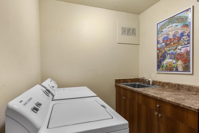 2137 Overlook Ln Unit 104, Steamboat Springs, CO 80487 - washroom featuring washer and dryer and cabinet space
