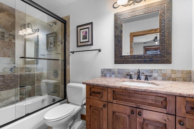 2137 Overlook Ln Unit 104, Steamboat Springs, CO 80487 - bathroom with toilet, vanity, and enclosed tub / shower combo