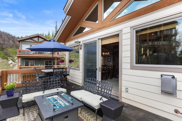 2137 Overlook Ln Unit 104, Steamboat Springs, CO 80487 - view of patio / terrace with an outdoor fire pit and outdoor dining area