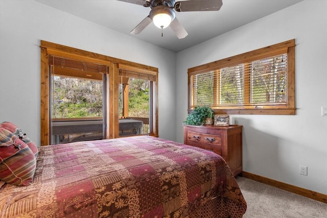 2137 Overlook Ln Unit 104, Steamboat Springs, CO 80487 - carpeted bedroom featuring baseboards and a ceiling fan
