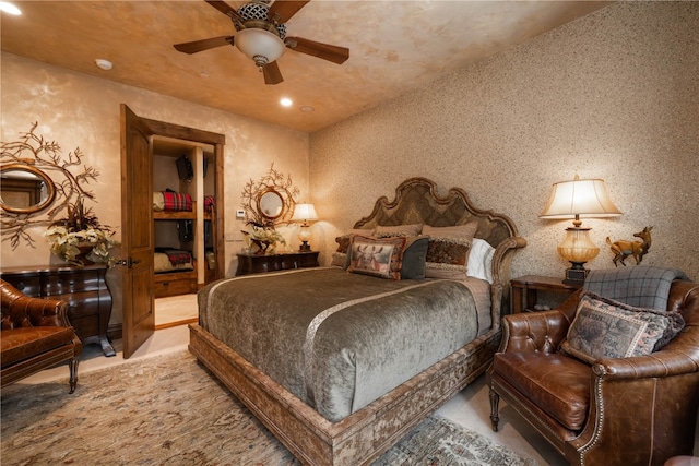 bedroom featuring recessed lighting, ceiling fan, and wallpapered walls