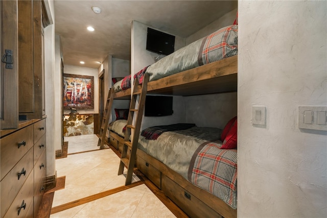 bedroom featuring recessed lighting and light tile patterned floors