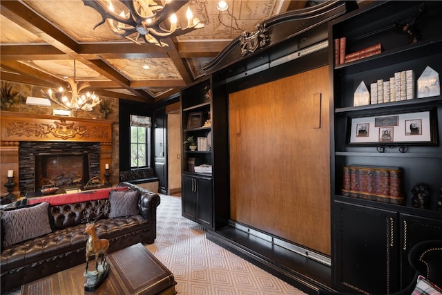 interior space featuring a fireplace, a chandelier, coffered ceiling, and beam ceiling