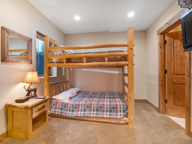 bedroom with baseboards, carpet, and recessed lighting
