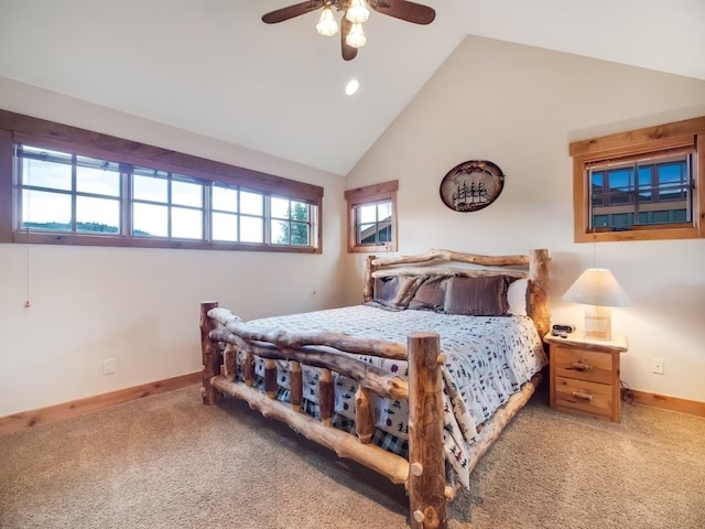 bedroom with lofted ceiling, a ceiling fan, baseboards, and light carpet