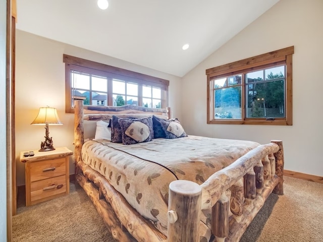 bedroom with recessed lighting, lofted ceiling, baseboards, and light colored carpet