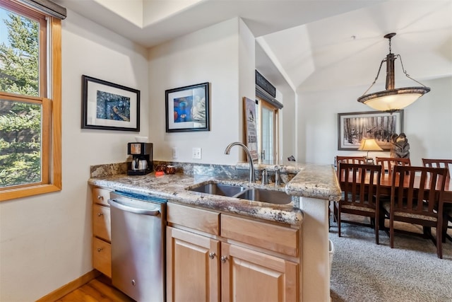 502 Northstar Dr Unit 1947, Keystone, CO 80435 - kitchen featuring dishwasher, a sink, light stone counters, light brown cabinets, and a peninsula