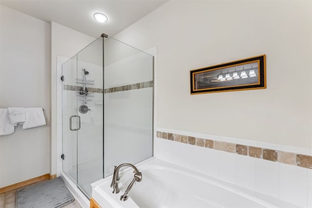 502 Northstar Dr Unit 1947, Keystone, CO 80435 - bathroom featuring a bath and a stall shower