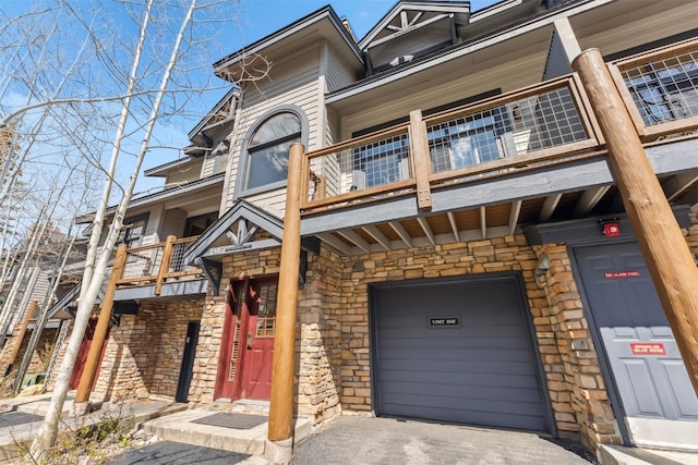 502 Northstar Dr Unit 1947, Keystone, CO 80435 - view of property with asphalt driveway and a garage