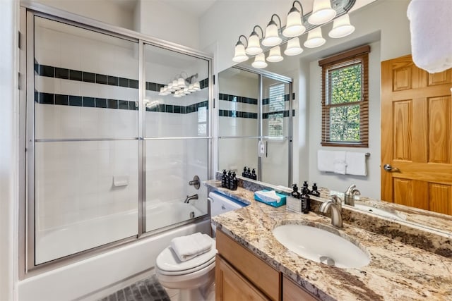 502 Northstar Dr Unit 1947, Keystone, CO 80435 - bathroom with toilet, vanity, and shower / bath combination with glass door