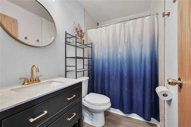 100 S Park Ave Unit E312, Breckenridge, CO 80424 - full bath with toilet, vanity, wood finished floors, and a shower with curtain