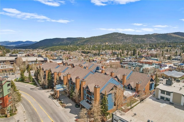 100 S Park Ave Unit E312, Breckenridge, CO 80424 - aerial view of property's location featuring a mountainous background and nearby suburban area