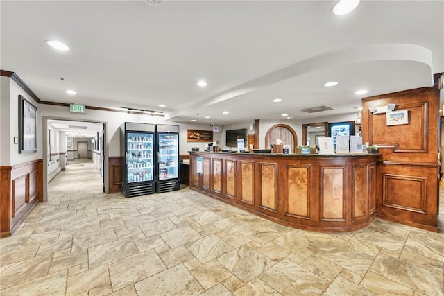 100 S Park Ave Unit E312, Breckenridge, CO 80424 - reception area with ornamental molding, recessed lighting, wainscoting, and a community bar