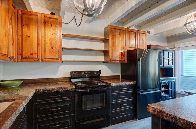3020 Village Dr Unit 222, Steamboat Springs, CO 80487 - kitchen with electric range, freestanding refrigerator, dark countertops, brown cabinetry, and a wood ceiling with exposed beams
