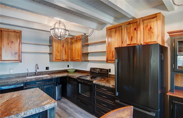 3020 Village Dr Unit 222, Steamboat Springs, CO 80487 - kitchen with black appliances, open shelves, dark countertops, light wood-style floors, and beam ceiling