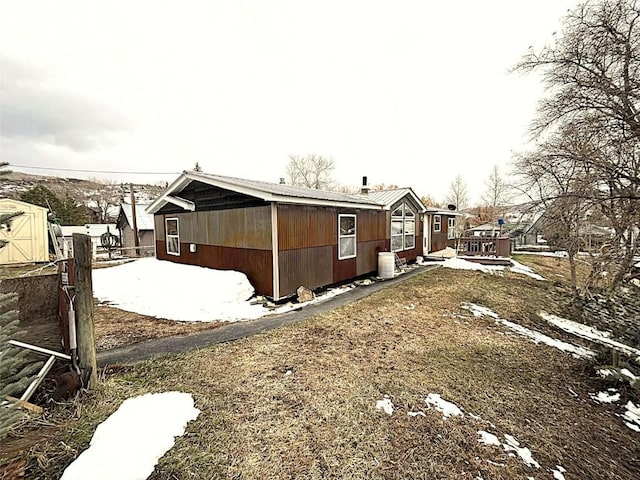315 E 1st St, Oak Creek, CO 80467 - view of home's exterior with a wooden deck