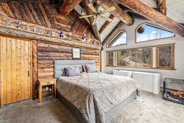 2350 Glacier Rdg, Steamboat Springs, CO 80487 - bedroom featuring log walls, high vaulted ceiling, beamed ceiling, and carpet floors
