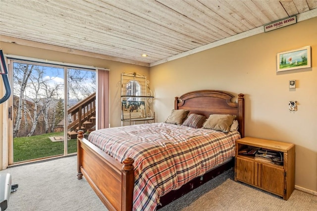 2350 Glacier Rdg, Steamboat Springs, CO 80487 - carpeted bedroom featuring baseboards, access to outside, and wood ceiling