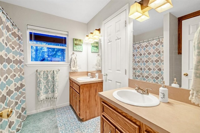 850 Georgia Pass, Lookout, Jefferson, CO 80456 - full bathroom featuring two vanities, baseboards, curtained shower, and a sink