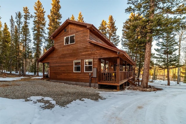 850 Georgia Pass, Lookout, Jefferson, CO 80456 - snow covered property with a porch
