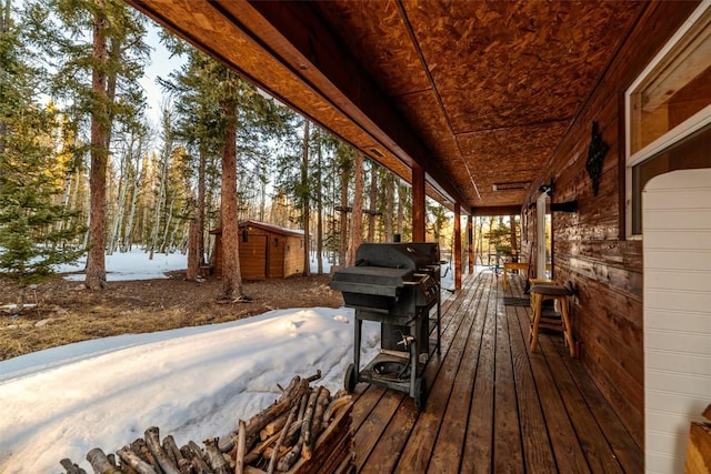 850 Georgia Pass, Lookout, Jefferson, CO 80456 - wooden terrace featuring a storage unit, an outbuilding, and area for grilling