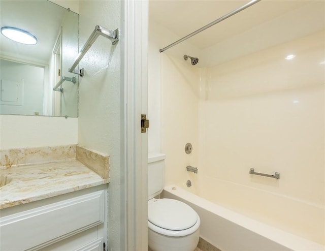 bathroom featuring tub / shower combination, toilet, and vanity