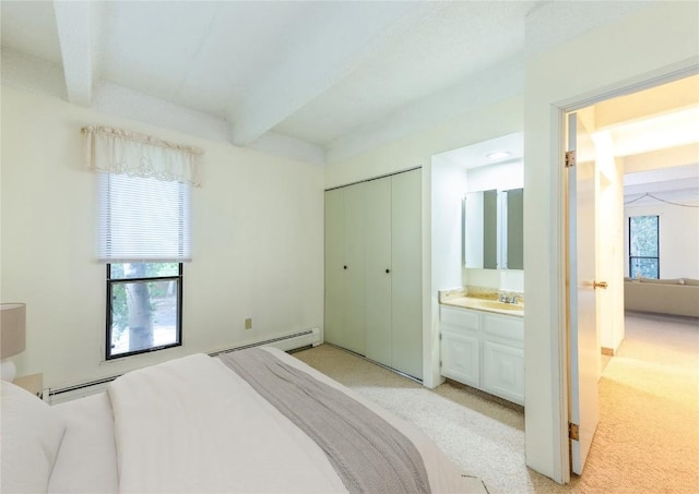 bedroom featuring a baseboard radiator, a closet, a baseboard heating unit, light carpet, and beamed ceiling