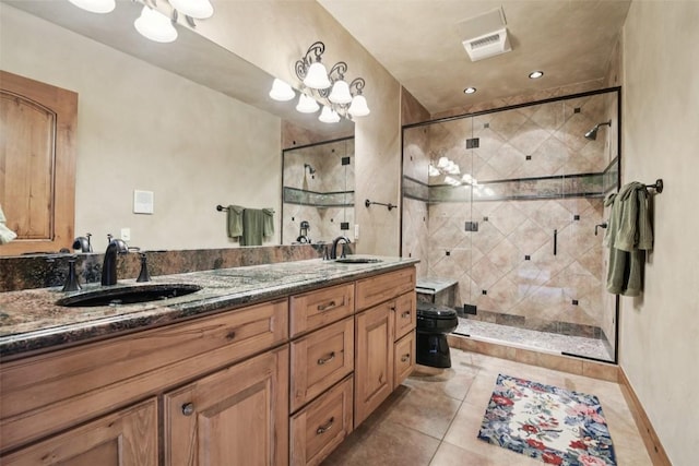 17 James Ct, Dillon, CO 80435 - bathroom with a stall shower, double vanity, and tile patterned flooring