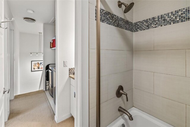 21 Cypress Ct, Steamboat Springs, CO 80487 - bathroom featuring washtub / shower combination and vanity