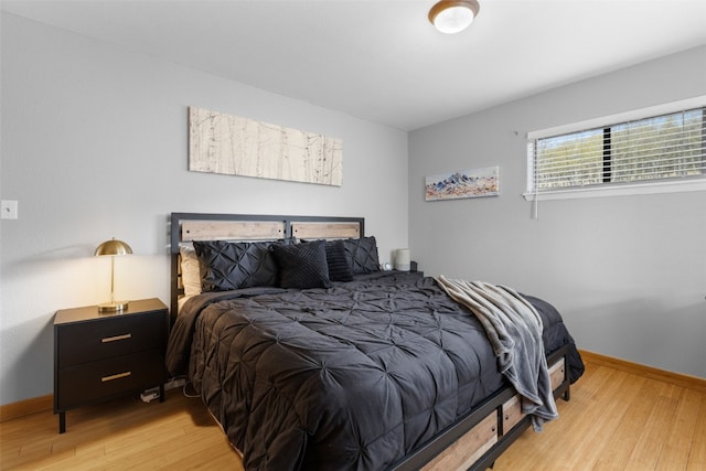 2349 Michigan Hill Rd, Jefferson, CO 80456 - bedroom with light wood finished floors and baseboards