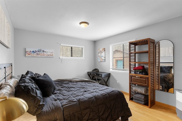 2349 Michigan Hill Rd, Jefferson, CO 80456 - bedroom with wood finished floors and baseboards