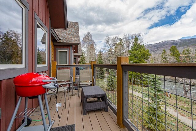 830 Blue River Pkwy Unit 203, Silverthorne, CO 80498 - balcony featuring a grill and a mountain view