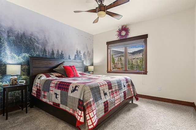 830 Blue River Pkwy Unit 203, Silverthorne, CO 80498 - carpeted bedroom with baseboards and a ceiling fan