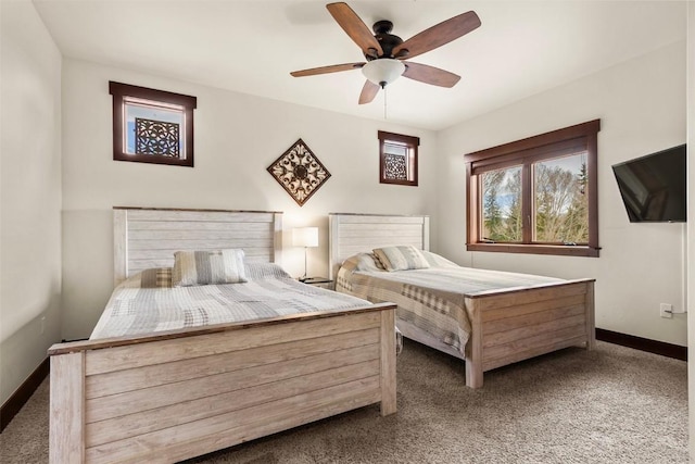 830 Blue River Pkwy Unit 203, Silverthorne, CO 80498 - bedroom featuring carpet, baseboards, and ceiling fan