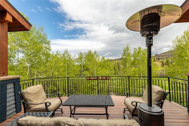 1115 Steamboat Blvd, Steamboat Springs, CO 80487 - deck featuring a view of trees