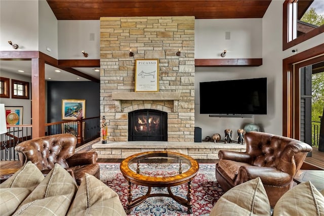 1115 Steamboat Blvd, Steamboat Springs, CO 80487 - living room featuring wooden ceiling and a fireplace