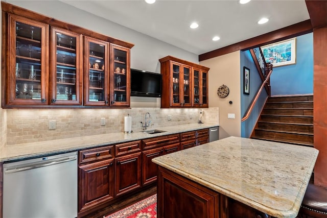 1115 Steamboat Blvd, Steamboat Springs, CO 80487 - kitchen with dishwasher, a sink, recessed lighting, dark wood-style floors, and tasteful backsplash
