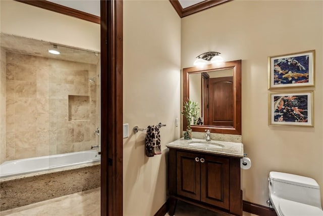 1115 Steamboat Blvd, Steamboat Springs, CO 80487 - bathroom featuring toilet, vanity,  shower combination, ornamental molding, and baseboards