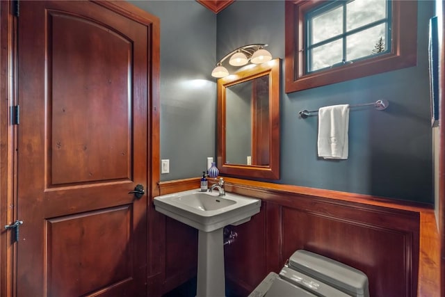 1115 Steamboat Blvd, Steamboat Springs, CO 80487 - bathroom with wainscoting and toilet