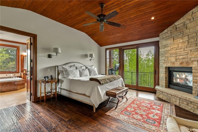 1115 Steamboat Blvd, Steamboat Springs, CO 80487 - bedroom featuring vaulted ceiling, access to outside, wood ceiling, ensuite bathroom, and a fireplace