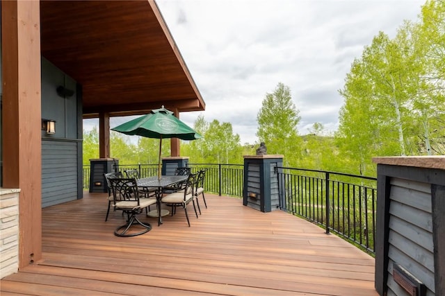 1115 Steamboat Blvd, Steamboat Springs, CO 80487 - wooden terrace featuring outdoor dining space