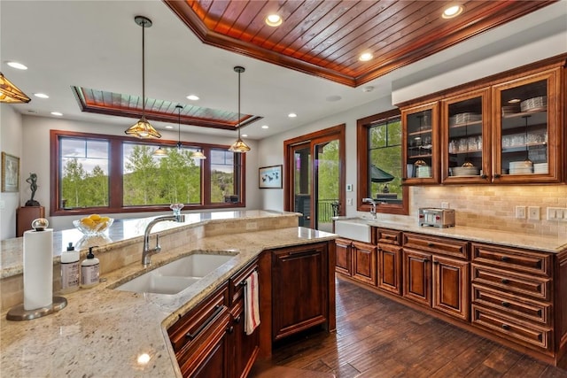 1115 Steamboat Blvd, Steamboat Springs, CO 80487 - kitchen featuring a sink, wood ceiling, healthy amount of natural light, light stone counters, and recessed lighting