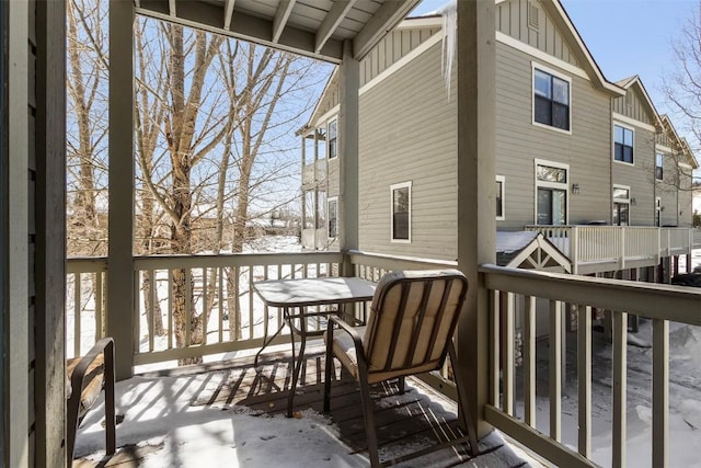 view of snow covered deck