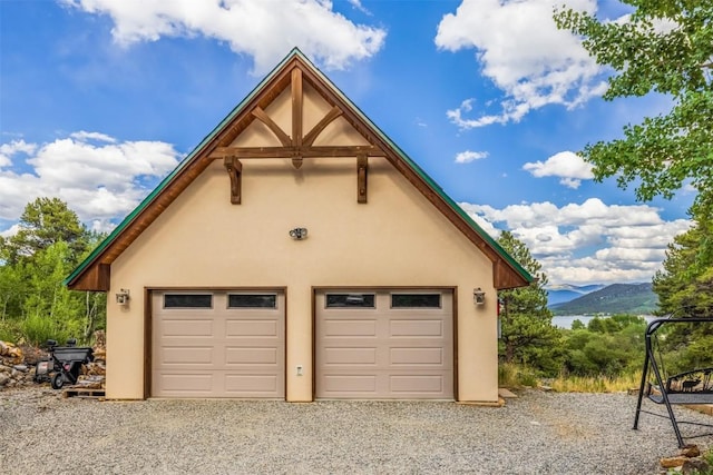 garage featuring a mountain view