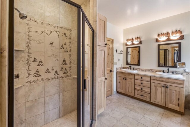 bathroom with vanity, tile patterned floors, and a shower with shower door